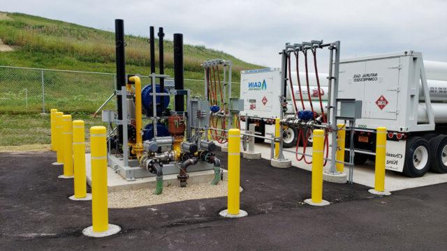 Two offloading trailers next to a decanting station